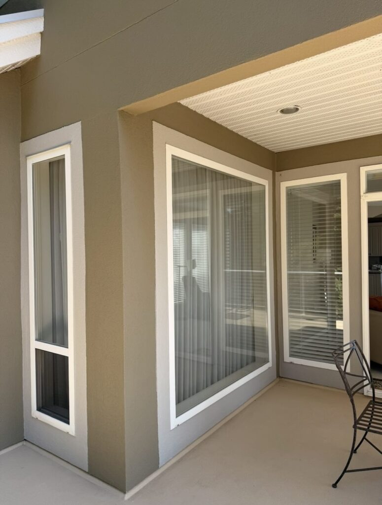 Spotless exterior windows on a covered patio after professional window cleaning in Surrey
